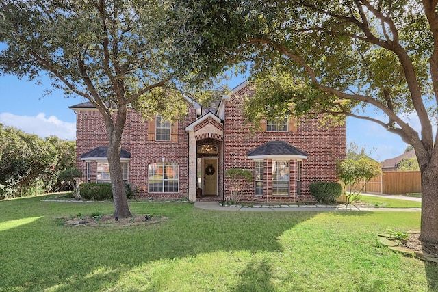 view of front of house with a front lawn