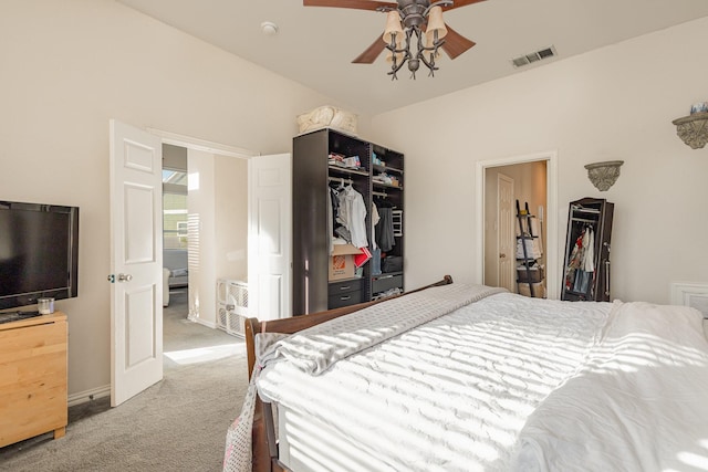 bedroom featuring carpet, ceiling fan, and a closet