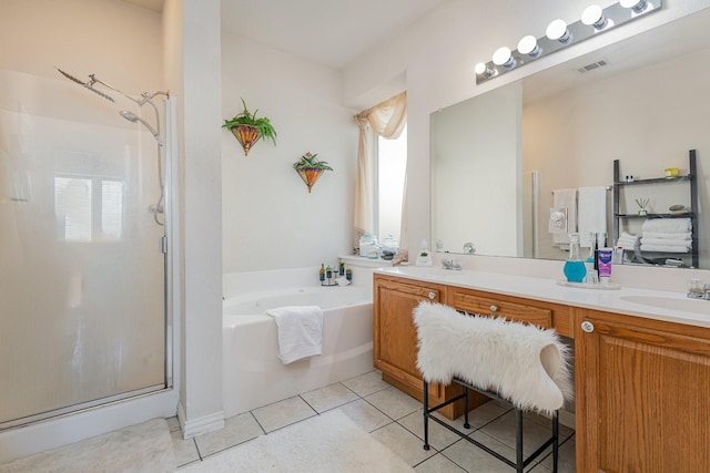 bathroom featuring vanity, tile patterned floors, and independent shower and bath