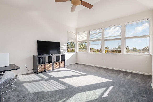 living room featuring ceiling fan, lofted ceiling, and carpet flooring