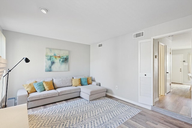 living room featuring light wood-type flooring