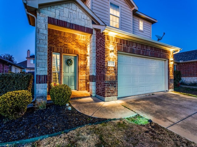 front of property with a garage