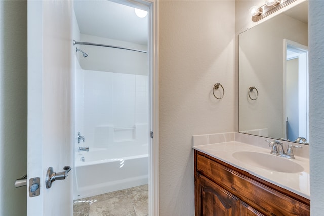 bathroom with vanity and bathtub / shower combination