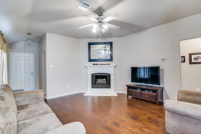 living room with dark hardwood / wood-style floors, vaulted ceiling, and ceiling fan