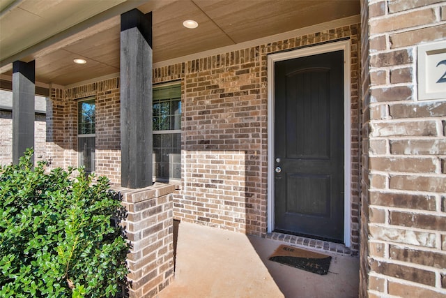 entrance to property with a porch