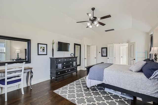 bedroom with lofted ceiling, dark wood-type flooring, and ceiling fan