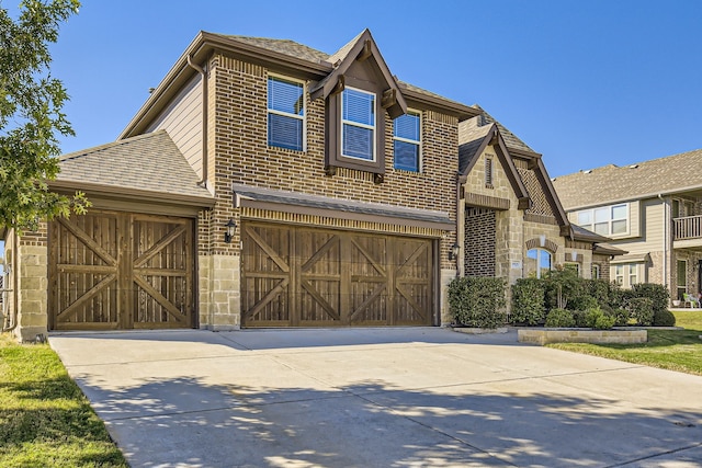 view of front of home featuring a garage