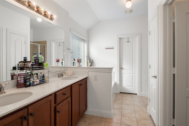 bathroom featuring vanity, tile patterned floors, vaulted ceiling, and plus walk in shower