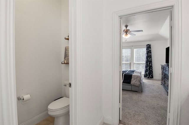 bathroom with toilet and ceiling fan