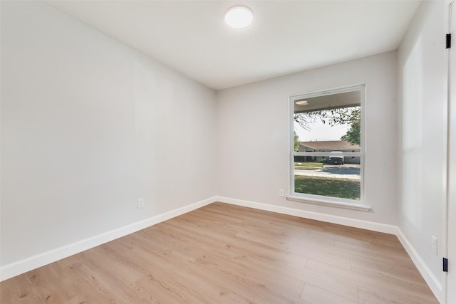 2511 Larchmont Dr, Mesquite, TX 75150 - spare room featuring light wood-style floors and baseboards