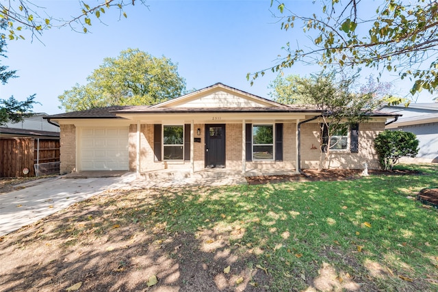 ranch-style house featuring a front yard, a garage, and a porch