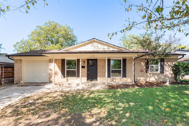 view of front of property with a front yard, a porch, and a garage