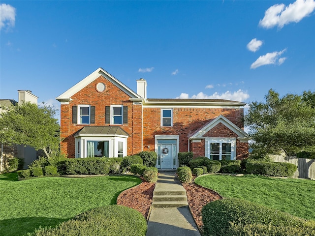 view of front property with a front lawn