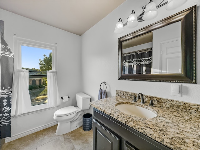 full bathroom featuring toilet, tile patterned flooring, vanity, and shower / tub combo