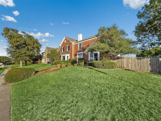 view of front facade with a front lawn