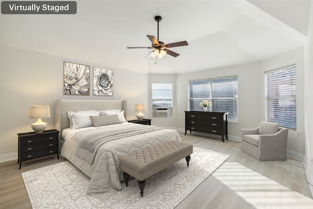 bedroom featuring light wood-type flooring and ceiling fan