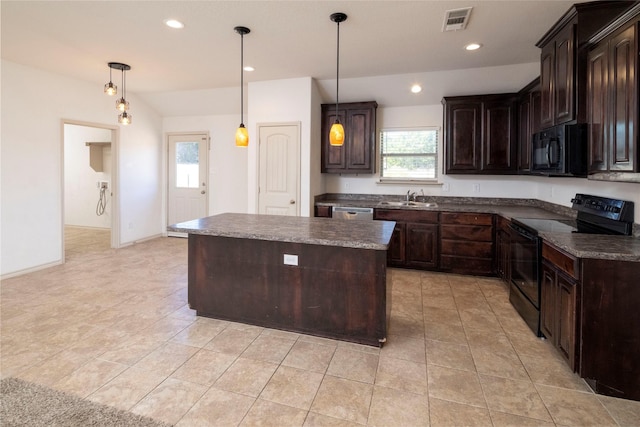 kitchen featuring a sink, black appliances, dark brown cabinetry, visible vents, and a kitchen island
