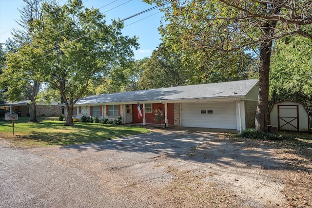 single story home with a front lawn and a garage