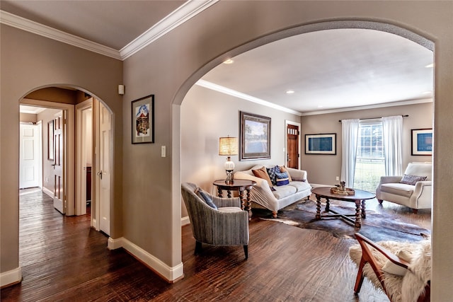 living room featuring ornamental molding and dark hardwood / wood-style floors