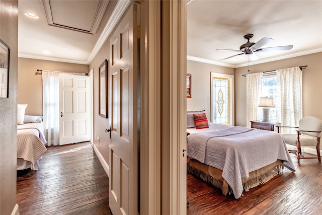 bedroom featuring ornamental molding, dark hardwood / wood-style floors, and ceiling fan