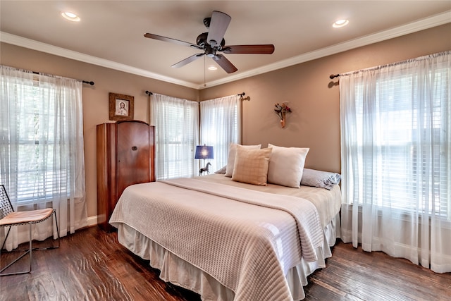 bedroom with ceiling fan, crown molding, multiple windows, and dark hardwood / wood-style flooring