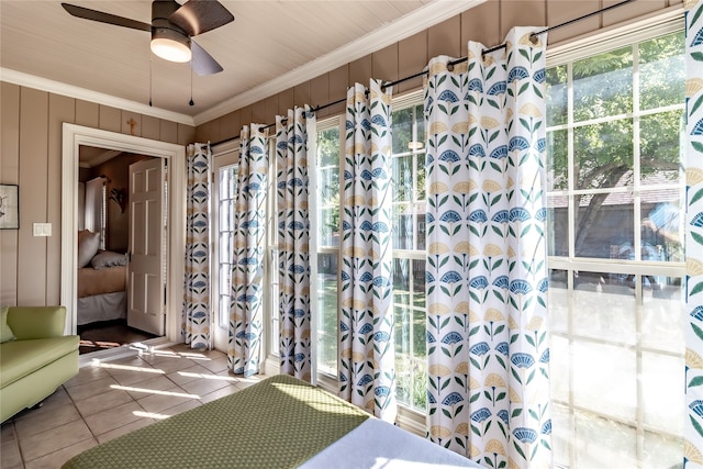 bathroom with crown molding, tile patterned floors, and ceiling fan