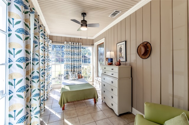 bathroom with wood ceiling, tile patterned flooring, wooden walls, ornamental molding, and ceiling fan