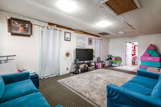 living room with carpet and a textured ceiling