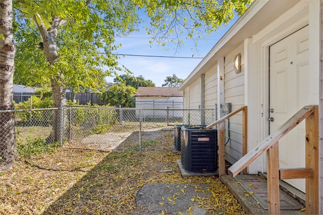 view of yard featuring central AC