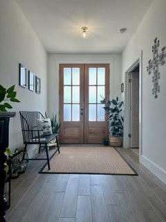 doorway to outside with hardwood / wood-style flooring and french doors