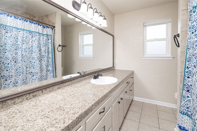 bathroom featuring vanity, curtained shower, toilet, and tile patterned flooring