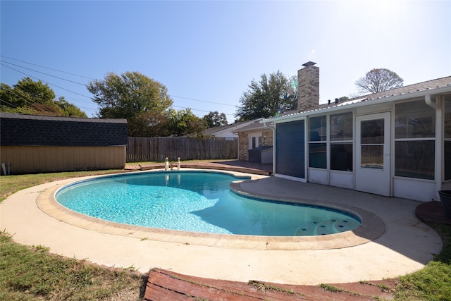 view of pool featuring a patio area