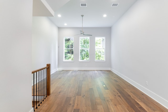 interior space featuring hardwood / wood-style floors and ceiling fan