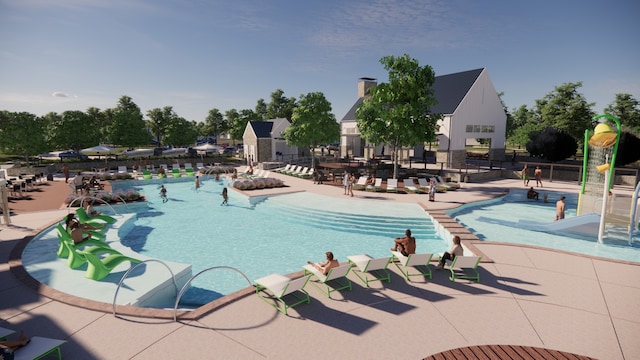 view of pool featuring a patio area and pool water feature