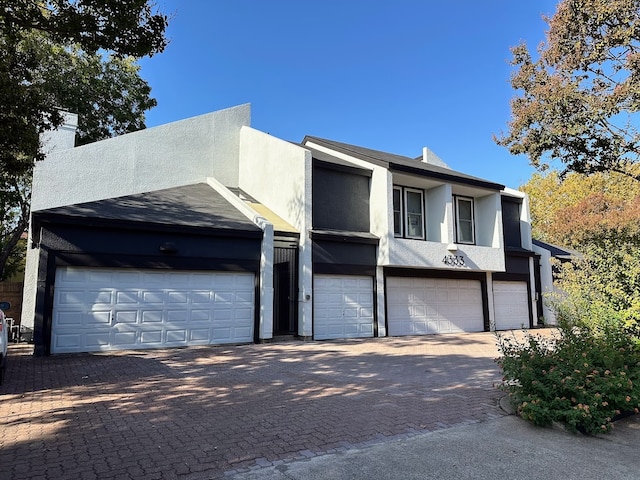 view of front of property featuring a garage