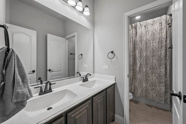 full bathroom featuring toilet, vanity, shower / bathtub combination with curtain, and tile patterned flooring