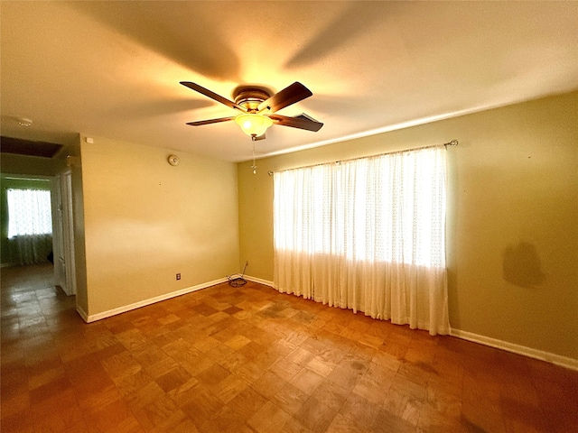 spare room featuring ceiling fan