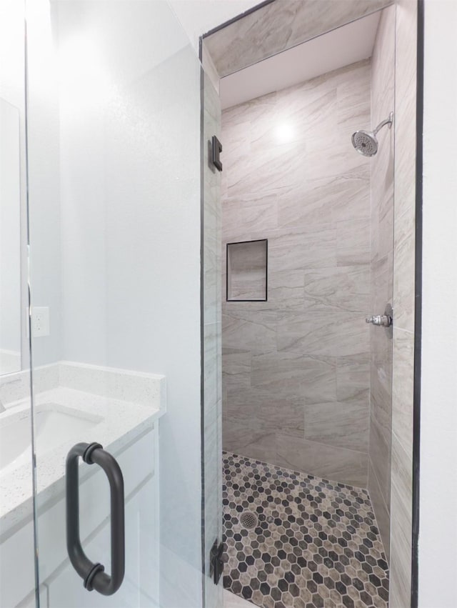 bathroom featuring walk in shower