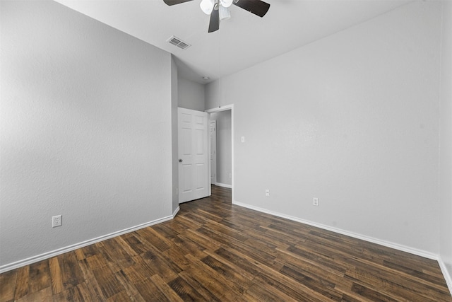 unfurnished bedroom featuring dark hardwood / wood-style flooring and ceiling fan