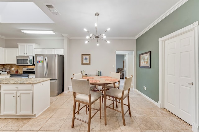 dining room with an inviting chandelier and ornamental molding