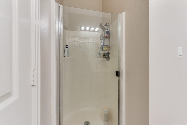 bathroom featuring walk in shower