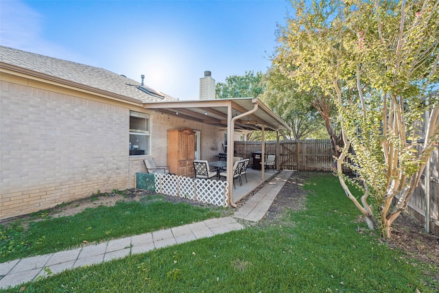 view of yard with a patio area