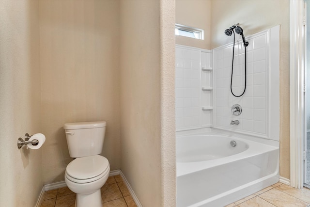 bathroom with tub / shower combination, toilet, and tile patterned flooring