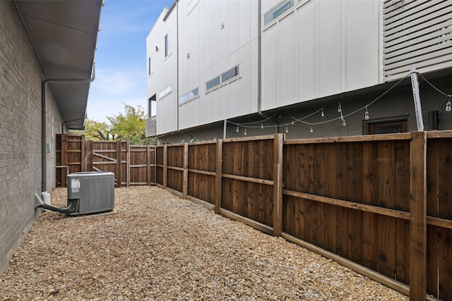 view of yard with central AC unit