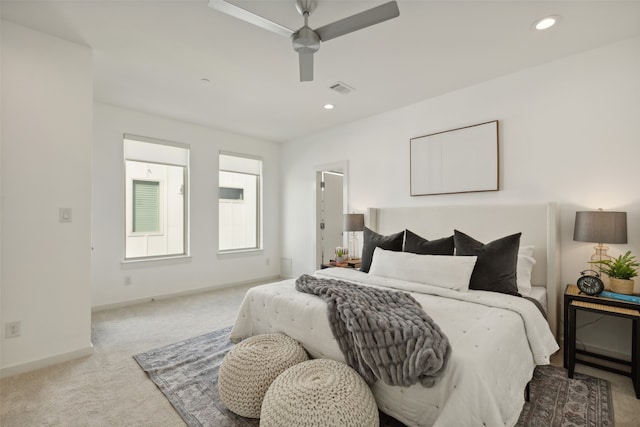 carpeted bedroom with ceiling fan