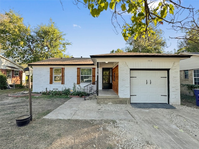 single story home with a garage