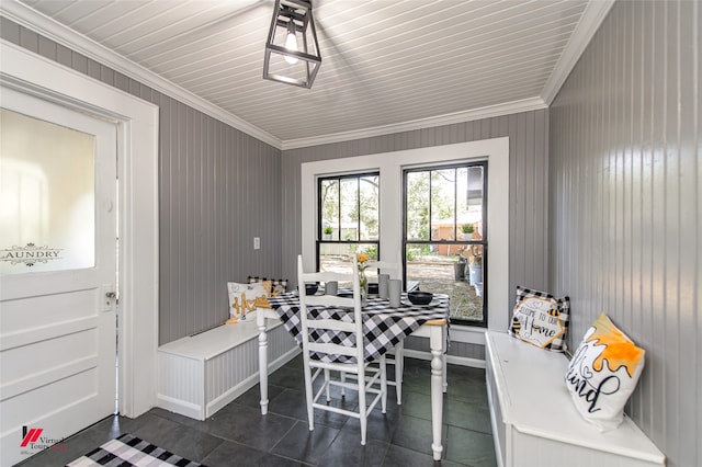 tiled dining area with crown molding