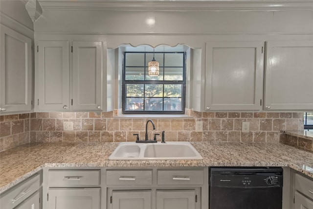 kitchen featuring white cabinetry, decorative backsplash, crown molding, a sink, and black dishwasher