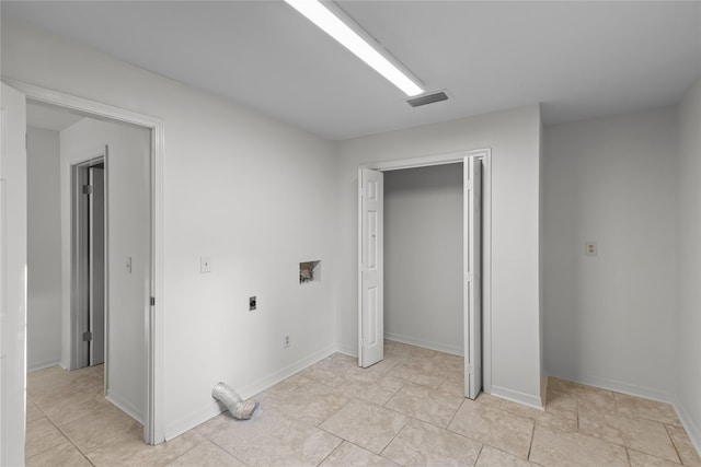 washroom with hookup for an electric dryer, laundry area, hookup for a washing machine, visible vents, and baseboards