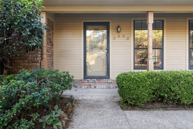 entrance to property with a porch